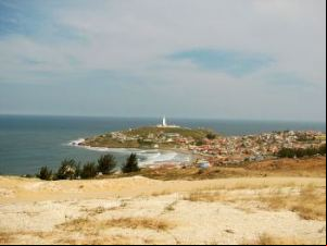 Farol de Santa Marta, aldea y Faro de fondo